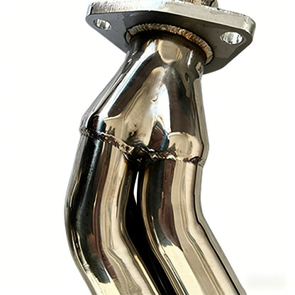 Close-up of TIG-welded joints and polished flange on AMVirtuo 304 stainless steel exhaust headers